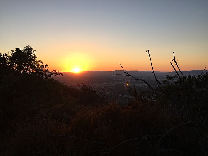 On the way up to the Hollywood Sign on Cahuenga Trail at sunset. Looking northwest, past the Wisdom Tree to Burbank.