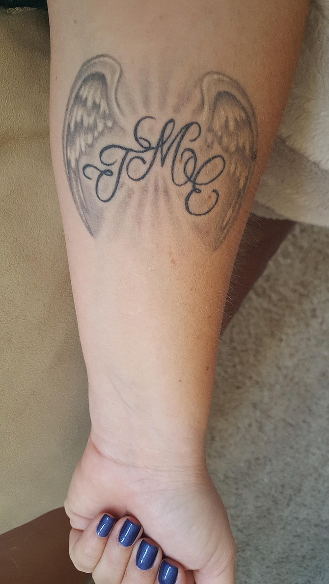 
Tattoo done by George Rupley at nittis in Chula Vista 

This tattoo has my 3 children's first initals, the M in the middle is for my middle child & wraps around the other 2 as their guardian angel, since she passed in 98'❤ 

I live in East County 43 yrs old I'm a beautiful wife & mother 

Tina 
