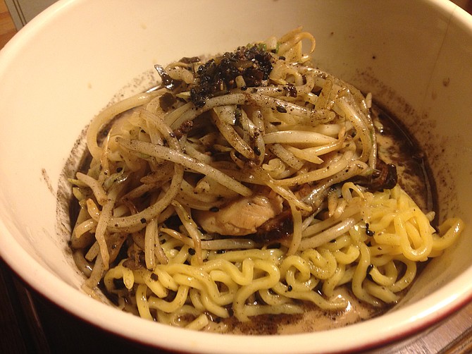 The black ramen from Izakaya Ouan doesn’t disappoint — it’s both black and ramen