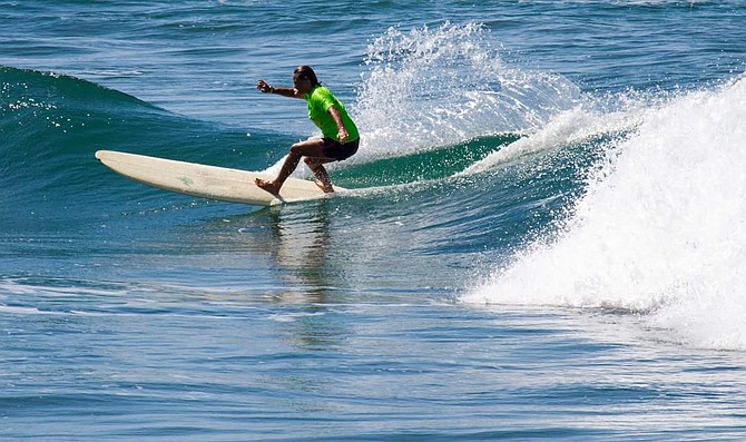 Oceanside Long Board Surf Contest winner Doreen Daligcon. (Age 50+) Image by Santos Sal Garcia – GlobalphotoUSA.com