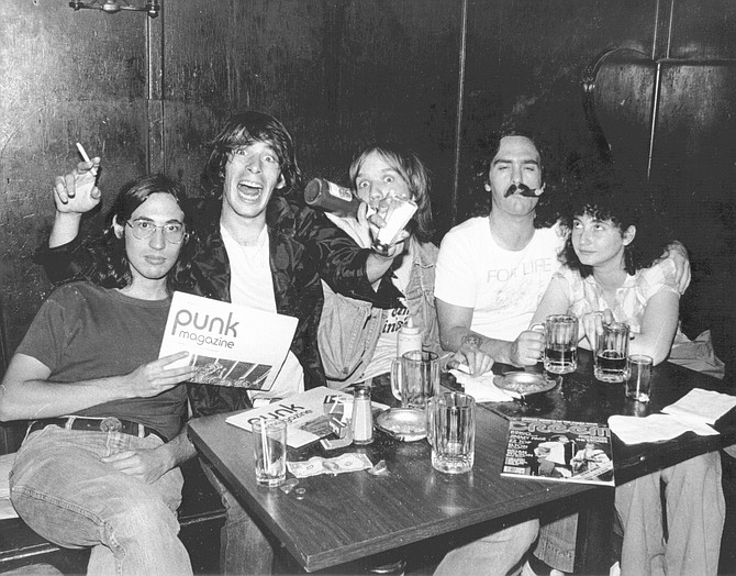Billy Altman, Legs McNeil, John Holstrom, the author, and Rosa Hoffman, 1976.  Right now I’m reading Please Kill Me, the Leggs McNeil/Gillian McCain oral punk thing.