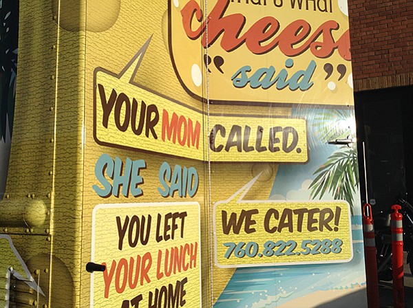 Truck has crazy familiar messages to look at while you wait for your burger and cheese fix
