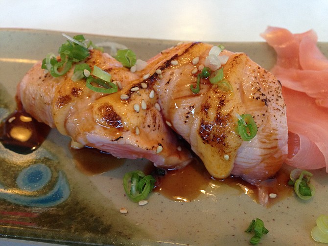 The 99-cent seared-salmon nigiri — totally worth it