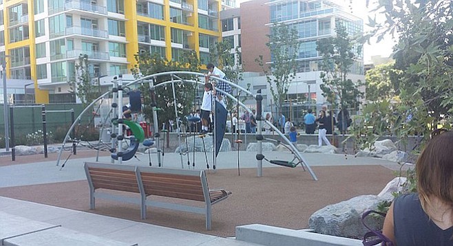 Playground at Fault Line Park (yellow-accented Pinnacle at the Park building in background)
