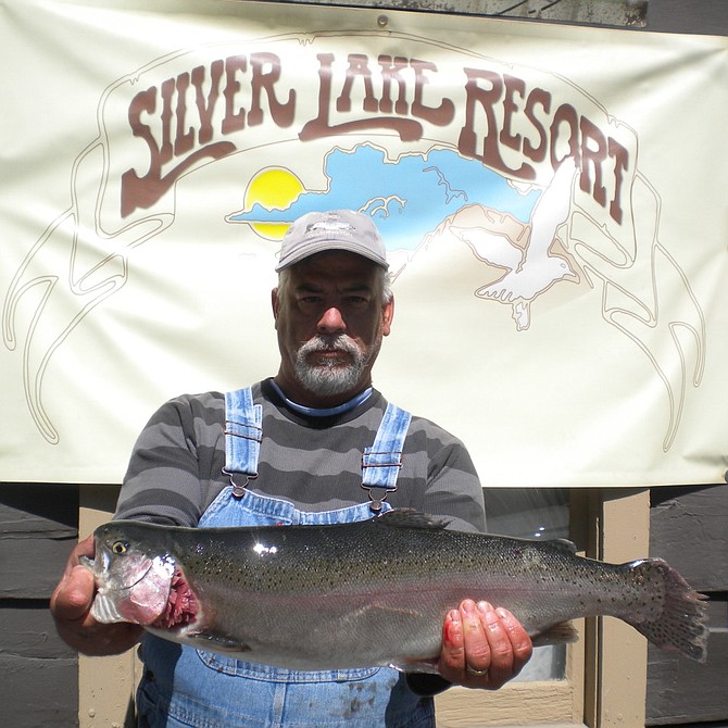 Darren Curtis of Jamul landed this Monster Rainbow fishing from a boat on Silver Lake using Berkley Power Bait. (Public photo courtesy of Silver Lake Resort/June Lake Loop/Eastern Sierras)