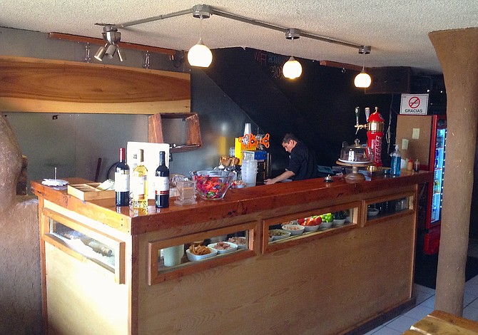 A view of the inside and the kitchen (fresh ingredients inside the counter)