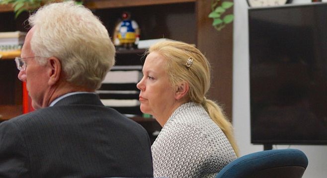 Attorney Paul Pfingst with Julie Harper after the jury was seated on September 10, 2015.