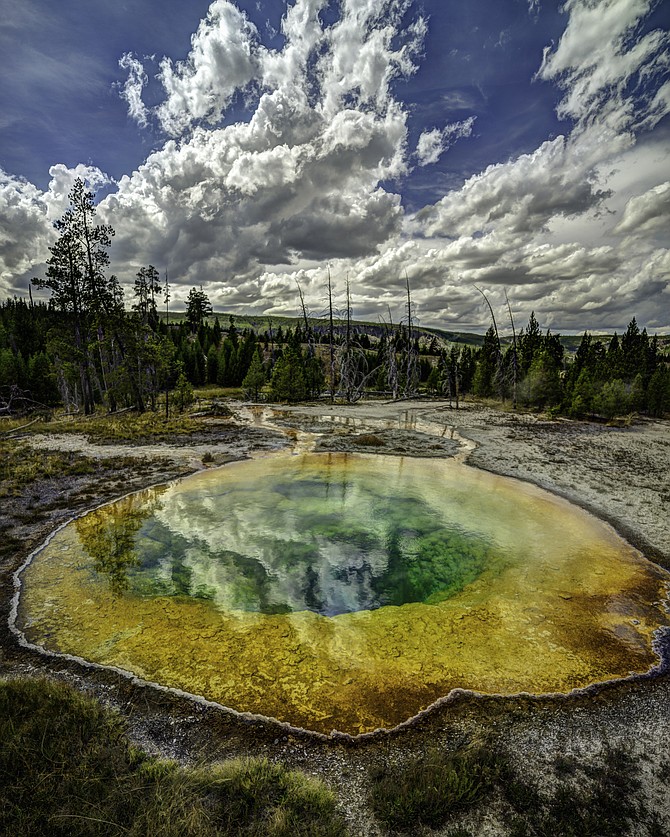 The Morning Glory Pool in Yellowstone National Park, Wyoming.
🔸 Sadly the color is fading, because of idiots tossing coins and trash into it. 9▫3▫15
