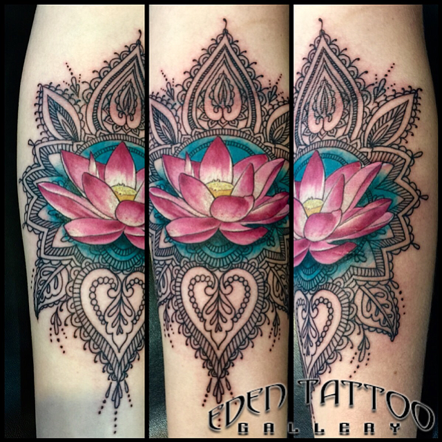 I got this Mehndi Lotus flower at Eden Tattoo in San Diego, by Mike Sirot. I got it to cover up some old scars on my arm. To me, it represents beauty, growth, love, and spirituality. I am 25, live in San Diego, and am a makeup artist ;) 