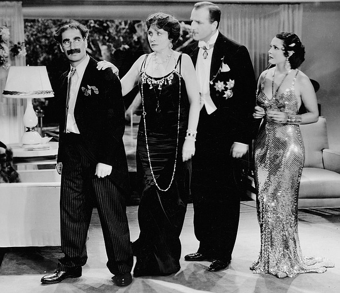 Firefly, Margaret Dumont, Louis Calhern, and Raquel Torres.