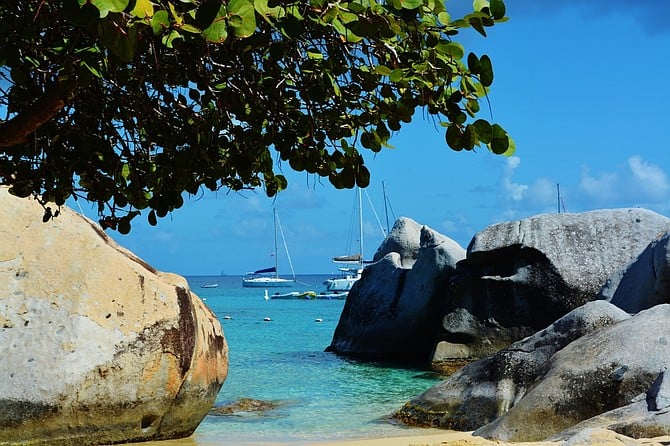 Sailboats moored outside The Baths.