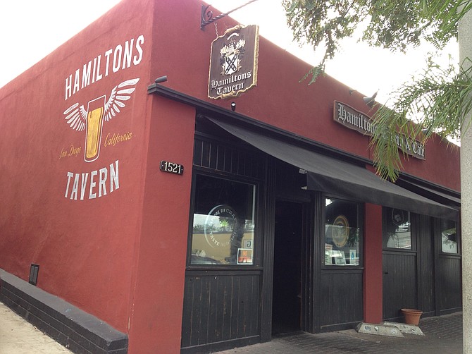 Hamilton’s Tavern, known for burgers, potato sandwiches, and spicy wings. Also, beer.