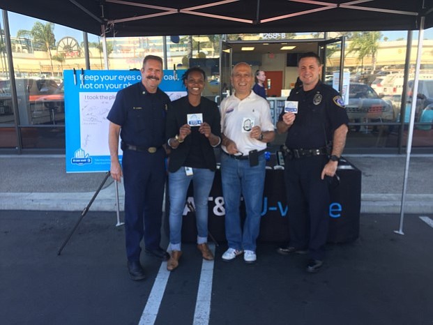 Fire Chief Mike Lowry, AT&T Store Manager Antoinette Maynard,
Escondido Mayor Sam Abed, Police Lieutenant Eric Skaja at AT&T's It Can Wait Event in Escondido on Oct. 31
