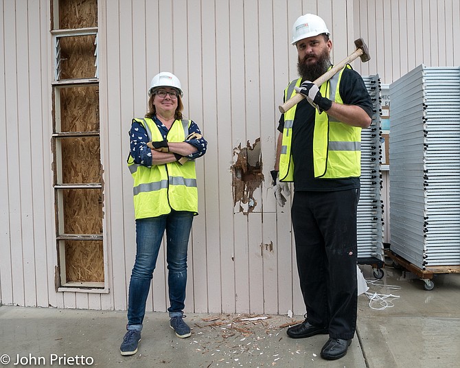 Fr. Doran Stambaugh and Eileen Hoppen with Level3 Construction on demolition  day.