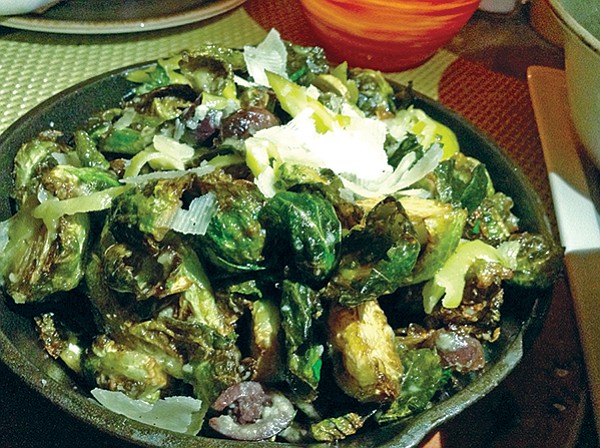 Brussels sprouts and mix in iron skillet. For five bucks. 