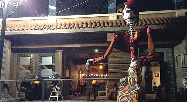Fifteen-foot-tall Day of the Dead figure guards the entrance to Entremundos