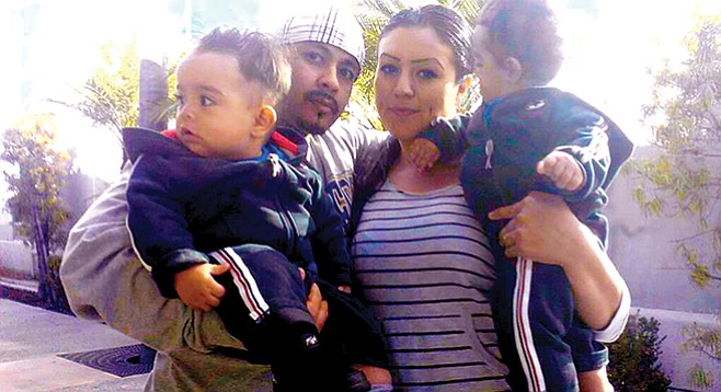 Angel Lopez with his family on January 15, 2013, just days before he was killed.