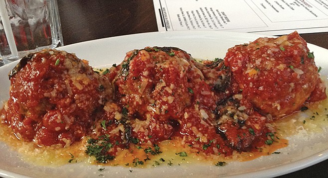 What $5 buys during happy hour: three zesty meatballs of beef, pork, veal