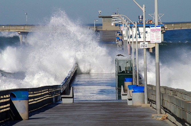 Washing the Pier


This morning I drove to the Ocean Beach Pier to see the high tide. It was amazing on a sunny beautiful day.  