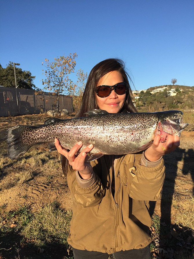 Bonita's Alyca Pia lands the biggest fish on opening day at Lake Wohlford  - 7 #, 2.5 oz. Nebraska Tailwalker rainbow on rainbow flavored Power Bait, from a boat, just east of the dock. 