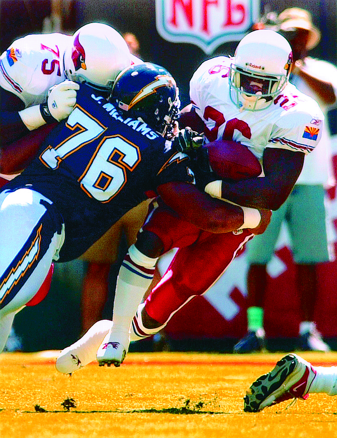 Jamal Williams (76) in Chargers – Cardinals game, 9/22/02. Sureldie Williams, wife  Jamal Williams, alleges her husband turned against her, striking out violently. Jamal was arrested at their daughter's La Jolla school,