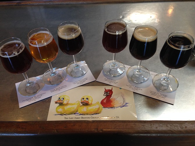 Vintage Flight at Lost Abbey's tasting room, complete with a devilish Duck Duck Gooze sticker