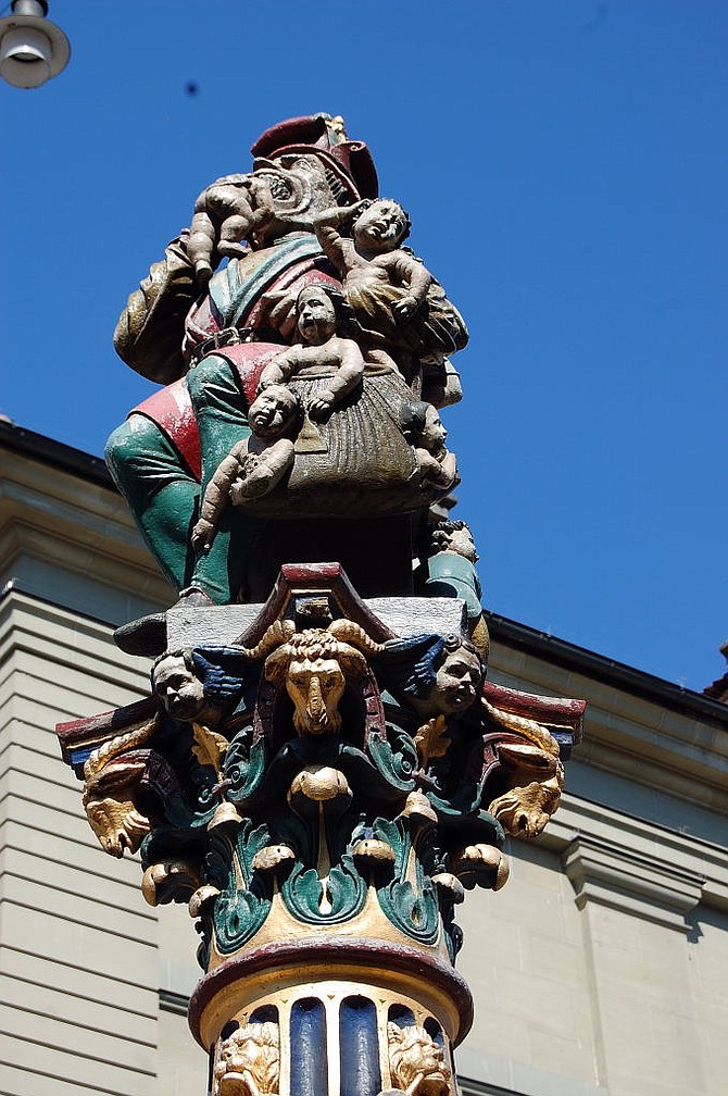 The 1546 Kindlifresser or "Child Eater" atop a fountain in Bern's Old Town.