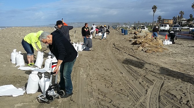 All hands on sandbag detail, January 6, 2015