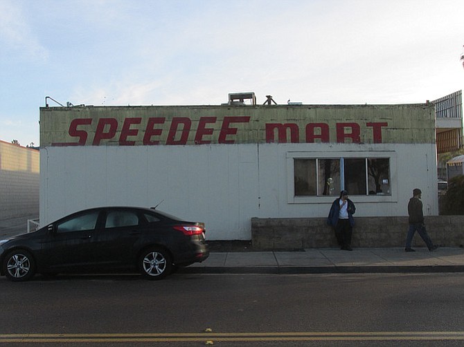 Speedee Mart's façade, recently exposed
