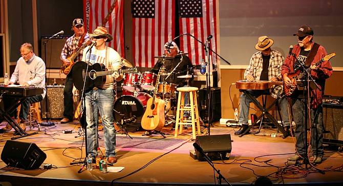 Greg White Jr and Desert Edge perform LIVE at "Country at the Grand" in support of Homes for Our Troops.

Photo by Gg Images