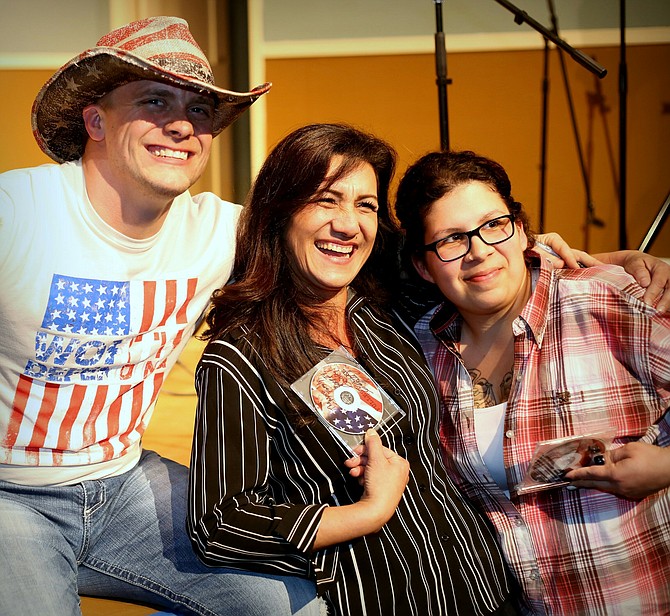 Autograph signing with Greg White Jr. at front of the stage after "Country at the Grand" in support of Homes for Our Troops.

Photo by Greg Nickel, Gg Nickel Images