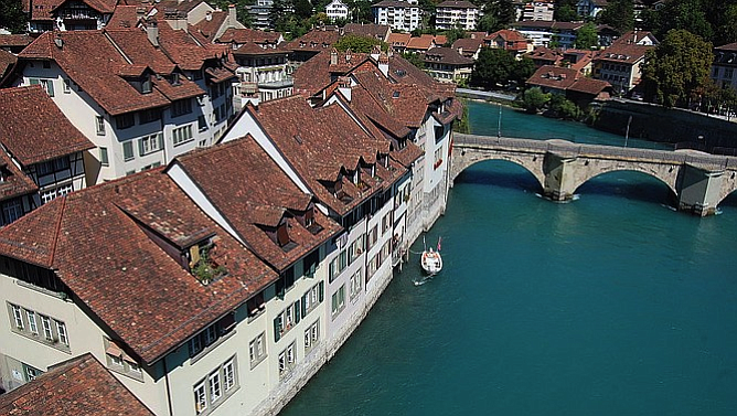 A view of the Aare and Bern's exquisite Old Town from the Nydeggbrücke bridge.
