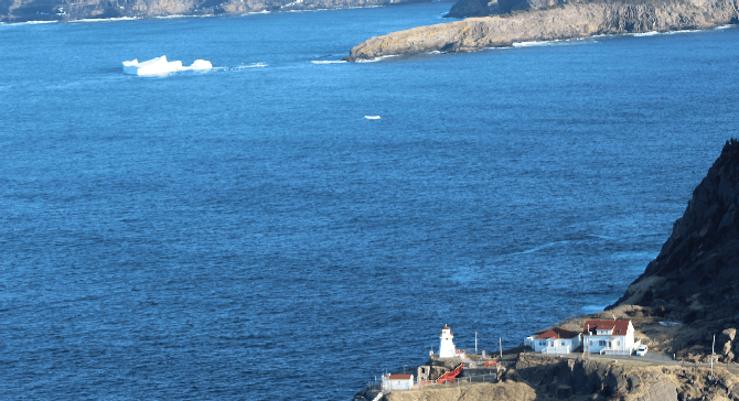 View from atop Newfoundland's Signal Hill, iceberg in the distance.