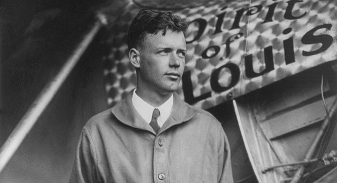 Charles Lindbergh and the plane in which he crossed the Atlantic in 1927