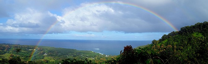Road to Hana Rainbow.

This is for the travel photo contest.

Taken with my cell phone on the Road to Hana, on the Hawaiian island of Maui. We saw this rainbow through the drizzling rain and were able to pull over to take this photo.