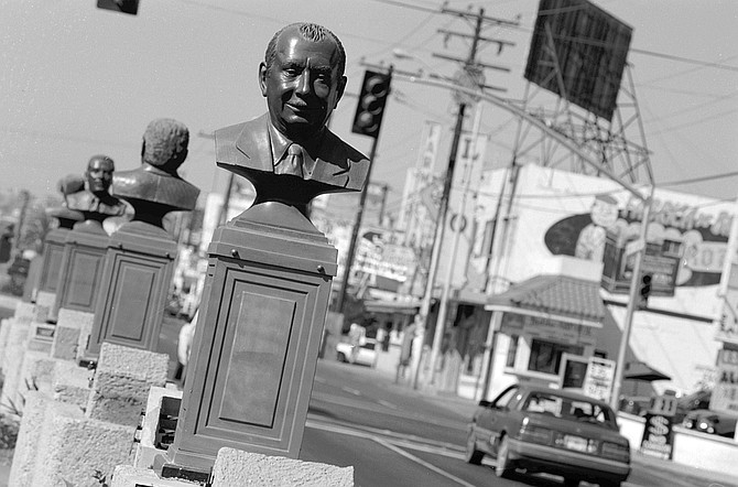Sixteen bronze busts of "Tijuana's founders" — businessmen, lawyers, politicians — stare westward down Boulevard Agua Caliente. - Image by Joe Klein