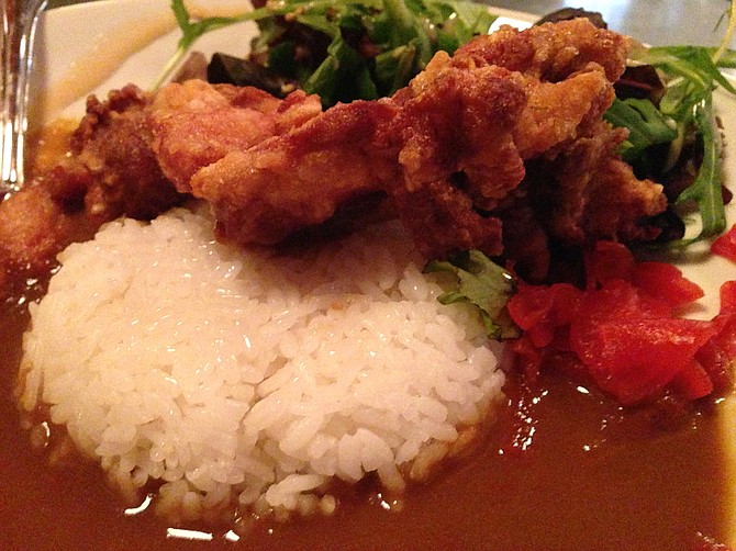 Karaage Chicken atop curry and rice