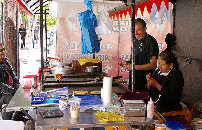 Tortillera and taquero working