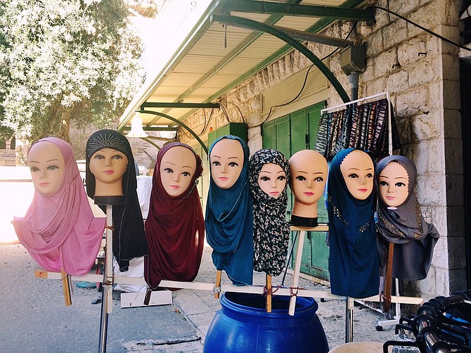Valley of the Hajib Dolls . . . outside a shop in Nazareth