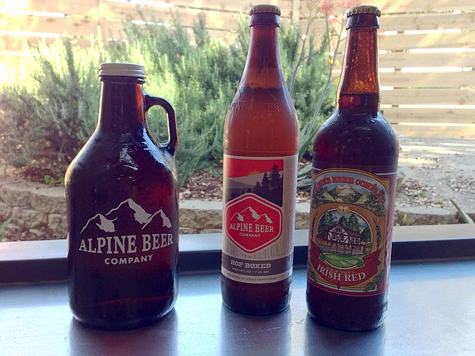 McIlhenney's Irish Red and Hop Boxed — two worthy growler pour options in Alpine.