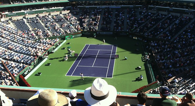 Taking in the action and desert sun from the Indian Wells grandstand.