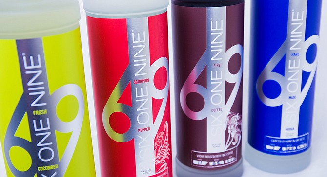 New brightly colored labels indicate 619 Vodka bottles distilled locally from sugar cane.