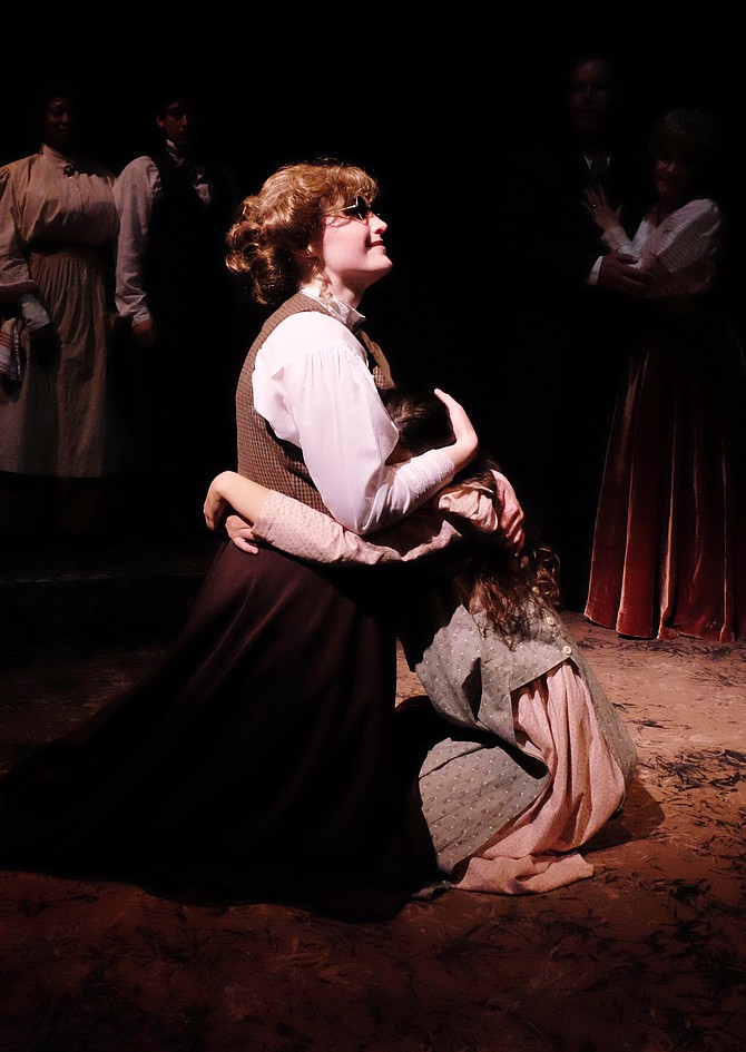 Kelsy Venter and Lucia Vecchio as Anne Sullivan and Helen Keller