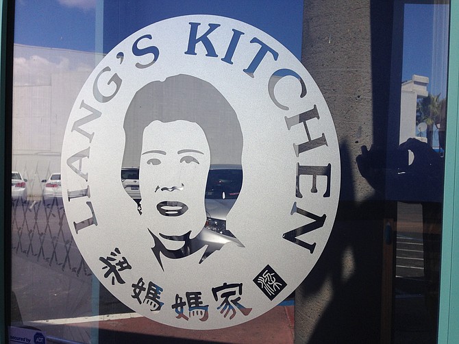 Mama Liang’s visage watches over her namesake restaurant.