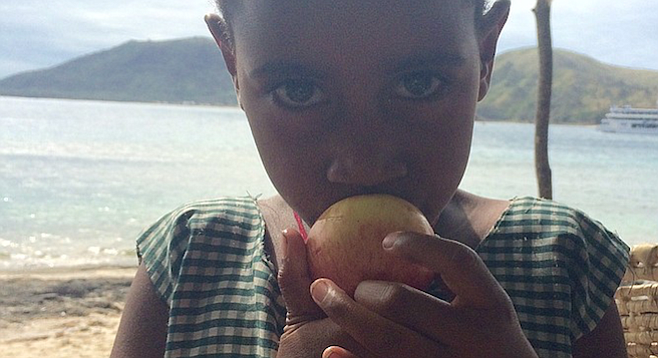 Fijian girl at the market in the Yasawa Islands, a two-hour ferry ride from Fiji's main island Viti Levu. 
