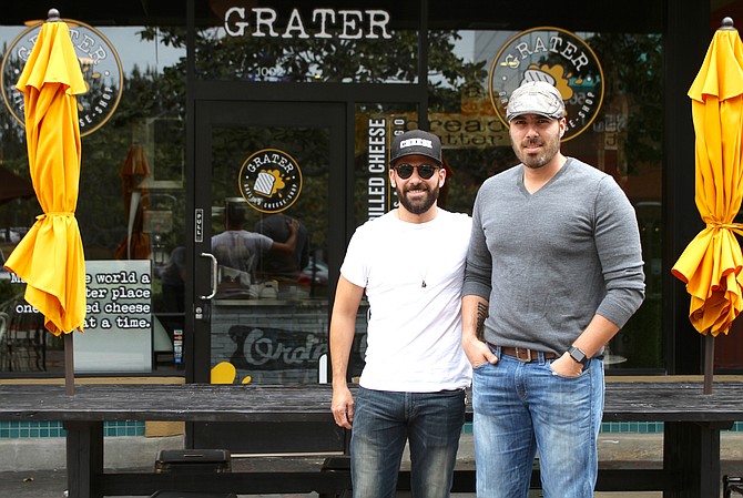 The Corbalá brothers in front of their newest location
