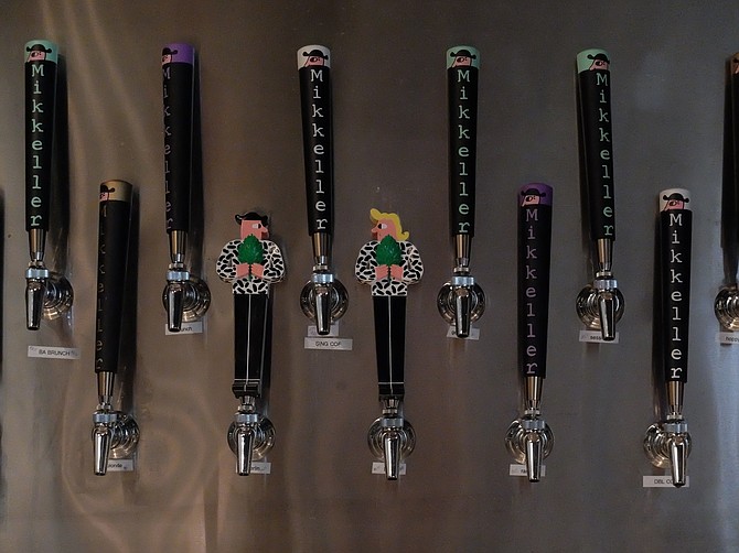 Mikkeller San Diego's tap handles include figurings of Henry and Sally, the cartoonish characters appearing on most Mikkeller beer labels.