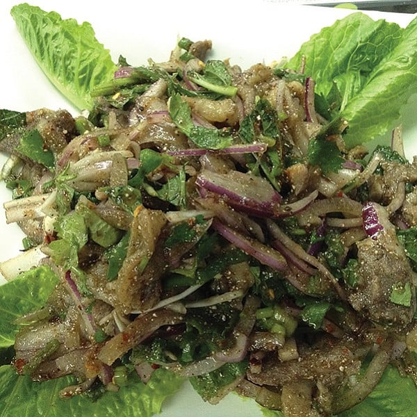 Larb, Laos’ beautiful mess of duck, salad, veggies, and spices