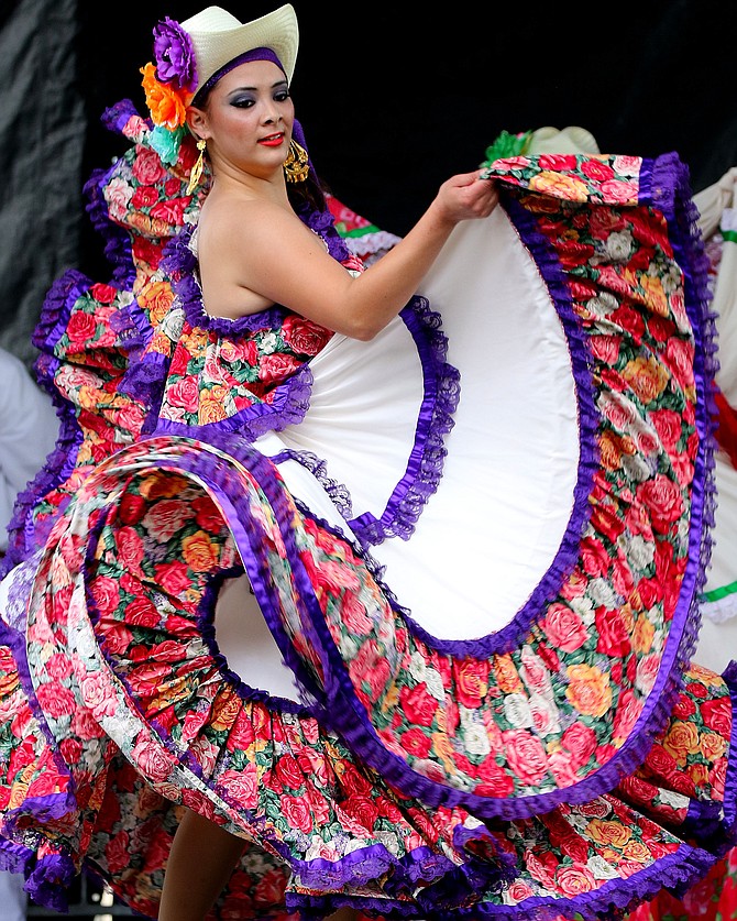 A dancer at the Fiesta De Reyes Folklorico Competition, Old Town San Diego in Celebration of Cinco de Mayo.

