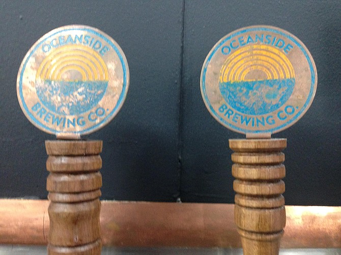 A local artist helped make the branded copper tap handles of Oceanside Brewing Company.